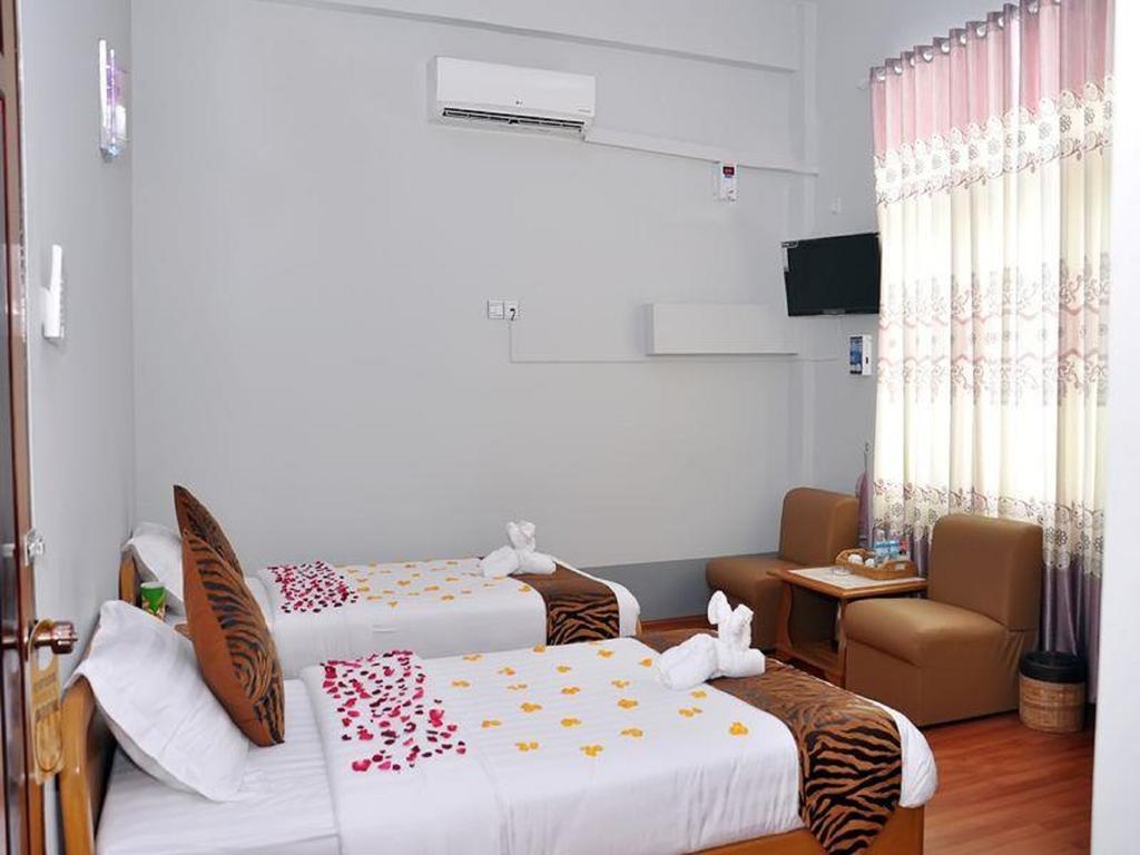 Royal Tulip Hotel Mandalaj Szoba fotó